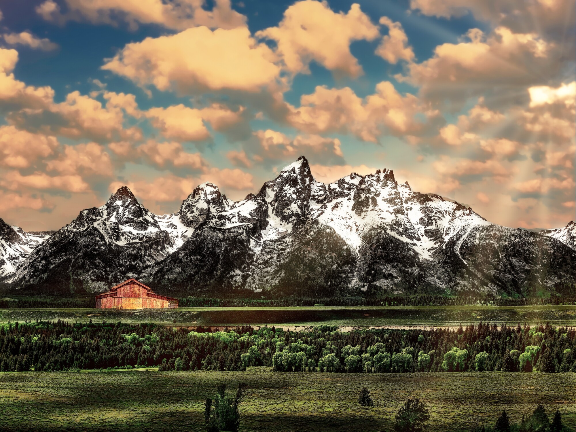 Beautiful shot of the Grand Teton National Park in Wyoming with snowy mountains in the distance