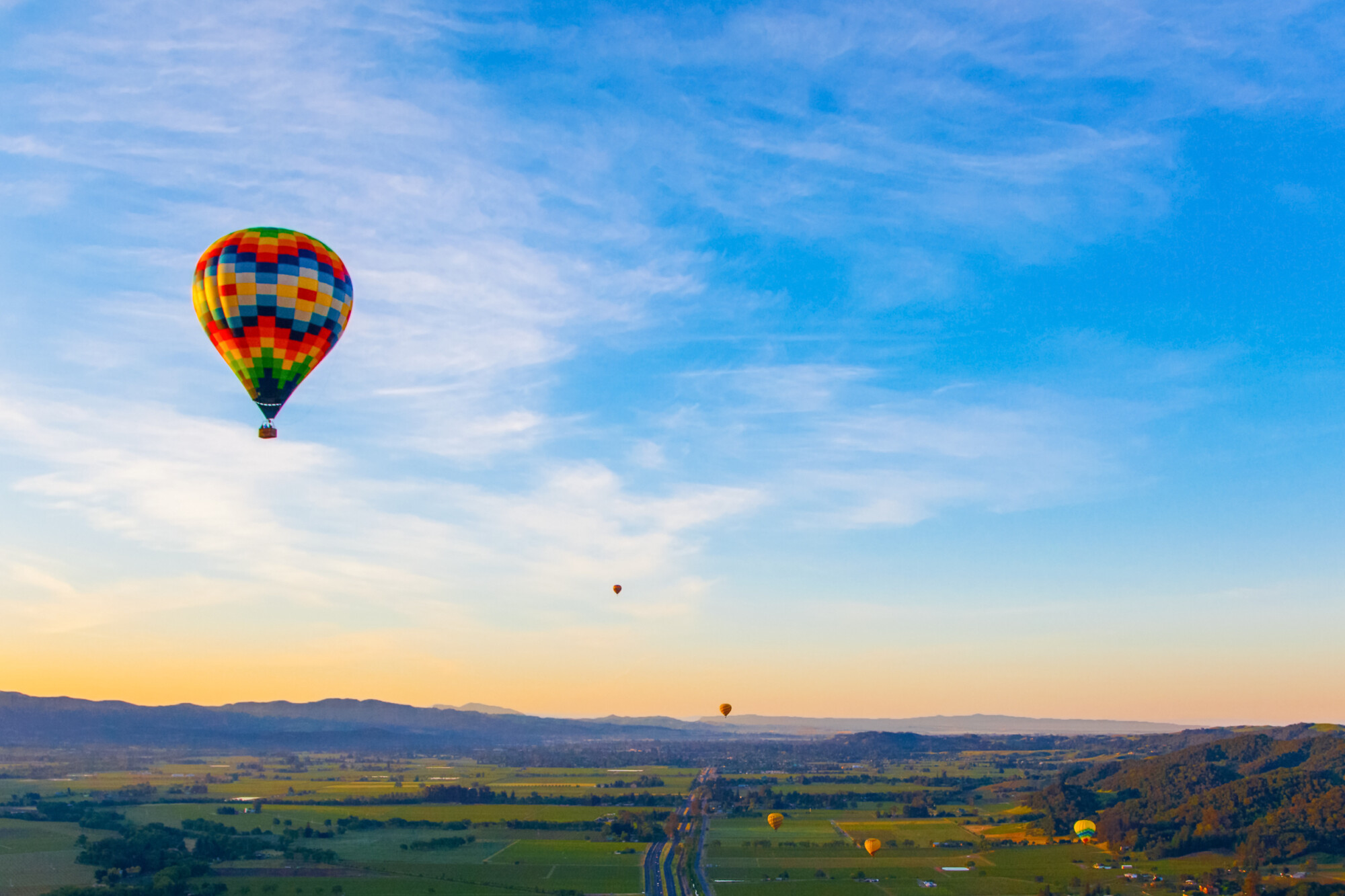 Hot Air Balloon Over Vineyards At Sunrise Over Napa Valley, Napa