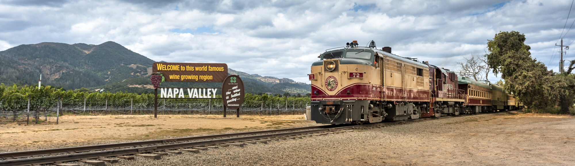 Yountville California Train on the tracks by the vineyard grapes in wine country